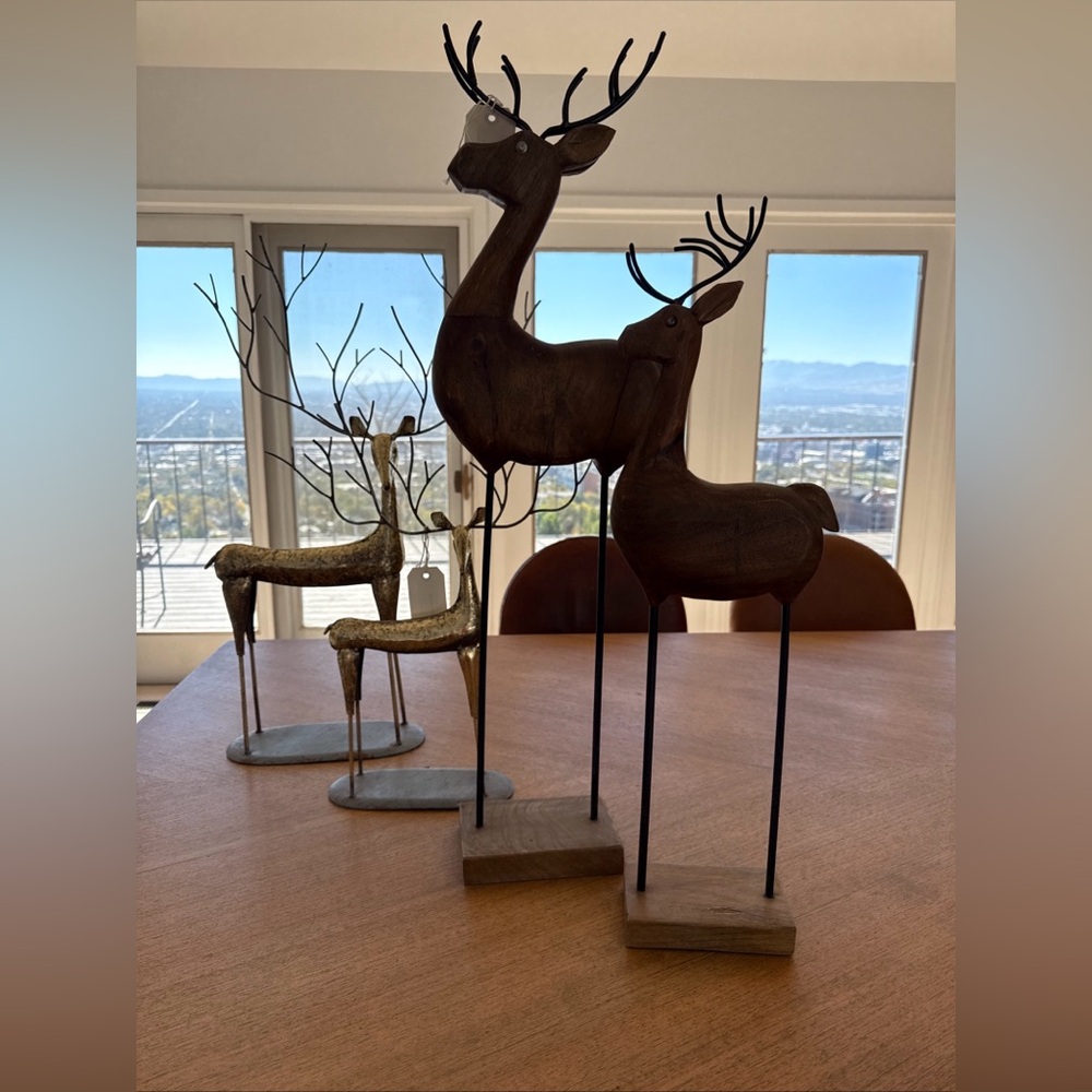 Wood carved deer set of 2 by Sherry Williamson-Kalalou. New from Sundance.
